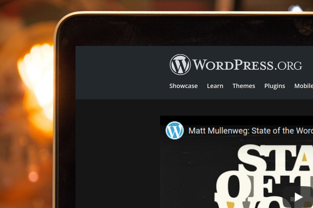 Laptop screen with wordpress official site opened on it